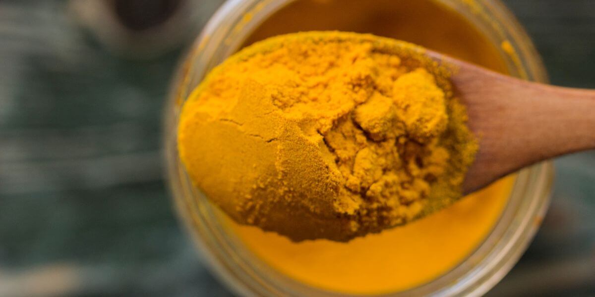 turmeric powder in spoon